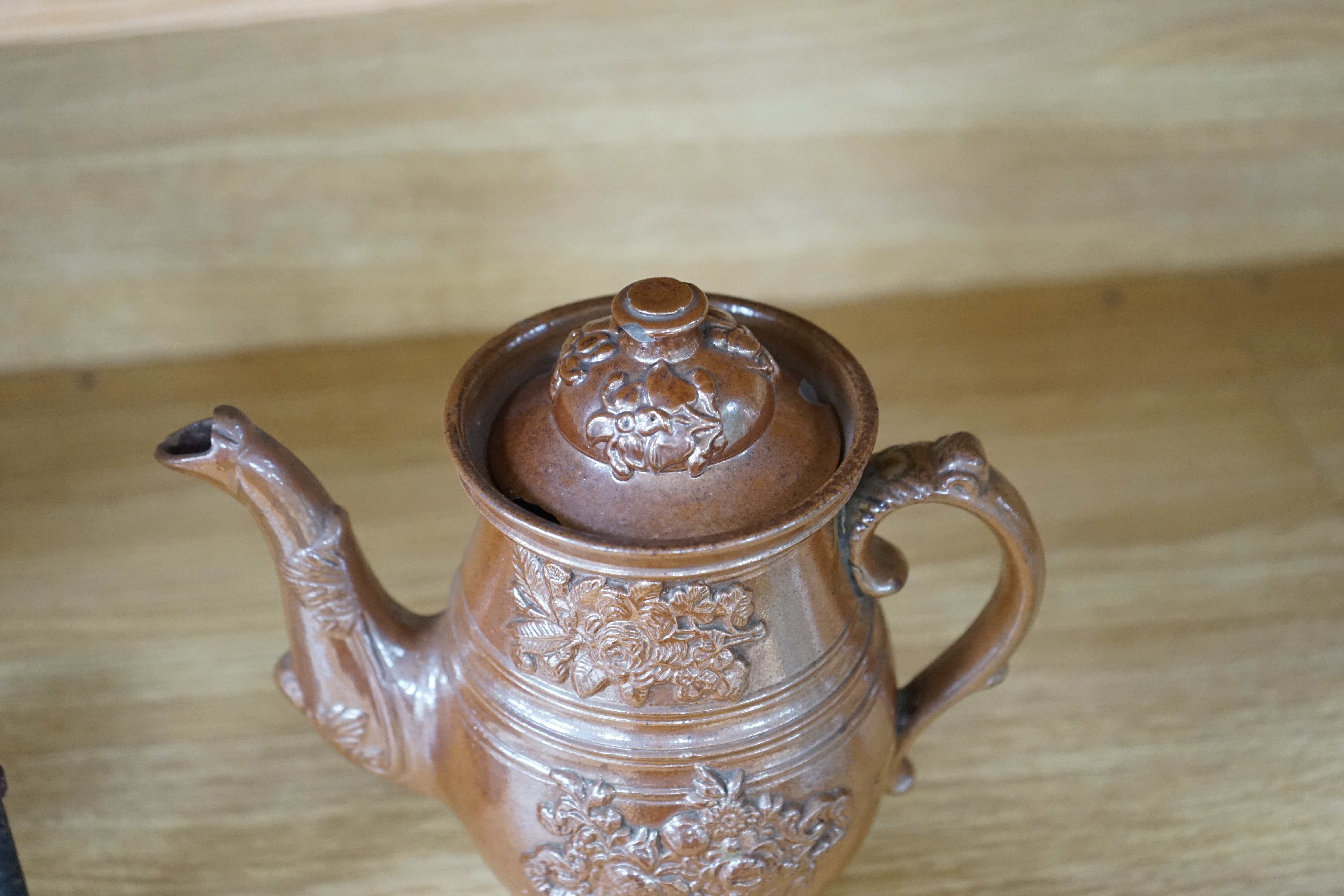 A Derbyshire salt-glaze coffee pot, 21cm high. Condition - fair, two significant chips to lid and other minor chipping.